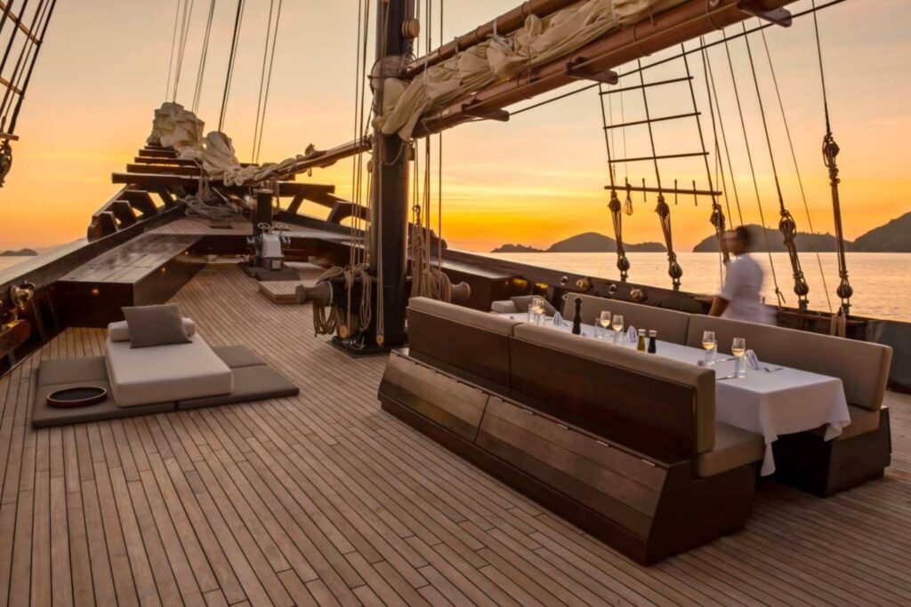 Amandira's beautiful private deck at sunset cruising in Raja Ampat