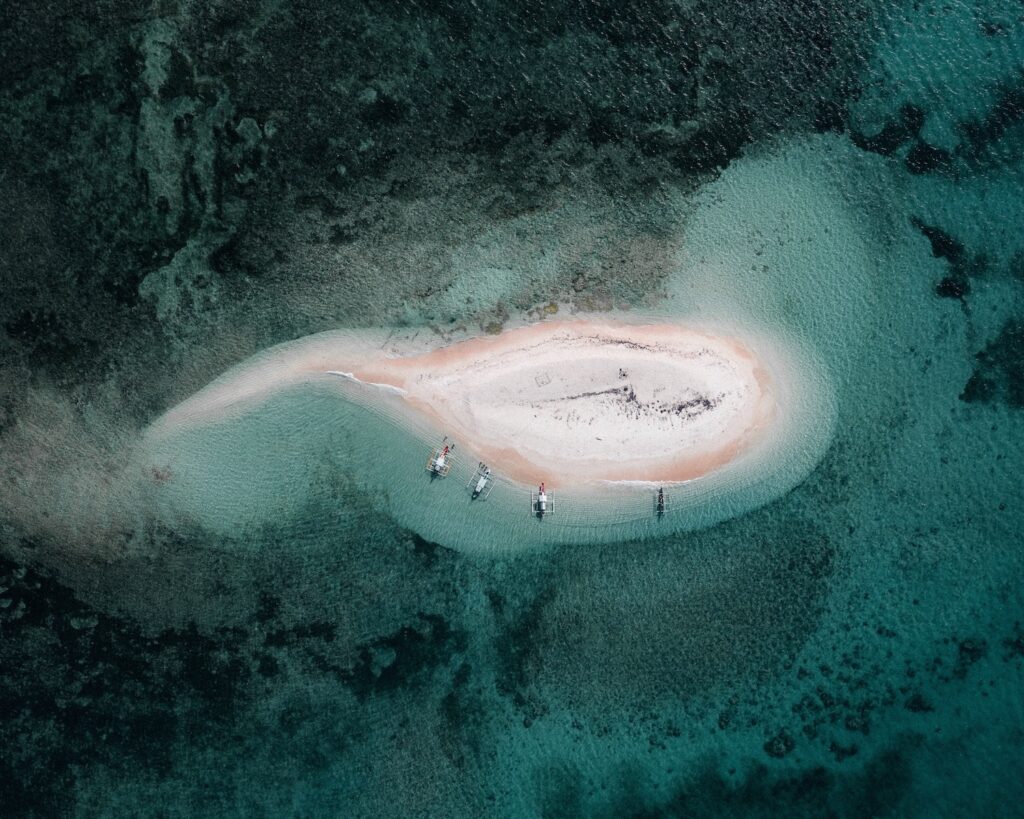 Desert Island Days with a picnic set up on a private sand bank in Komodo onboard a private yacht charte.